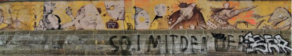 Wandbild an der Friedensstraße mit Werken von Artourette, Kumo, Andy K. und anderen.